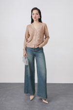 High-quality knitted sweater with V-neck, plaid pattern, and fashionable stone buttons with pockets