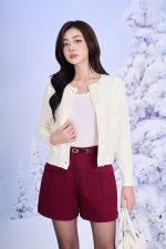 High quality sweater with short round neck and fashionable fringed hem, buttoned front