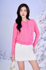 High quality sweater with short round neck and fashionable fringed hem, buttoned front