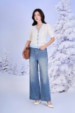 High-quality sweater with V-neck, short sleeves, slightly puffed body with pearl buttons, fashionable elastic hem
