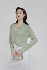 High-quality thin wool fabric sweater with V-neck slit and fashionable stone buttons