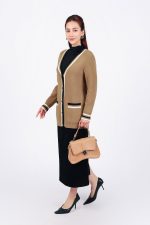 High-quality wool cardigan with deep V-neck and fashionable striped pockets