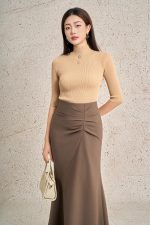 High-quality wool sweater with round neck and fashionable stone embellished body with stylish pockets