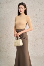 High-quality wool sweater with round neck and fashionable stone embellished body with stylish pockets