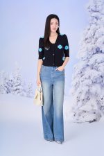 High-quality wool sweater with slim V-neck, slightly puffed sleeves and fashionable patterned body