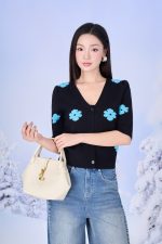 High-quality wool sweater with slim V-neck, slightly puffed sleeves and fashionable patterned body