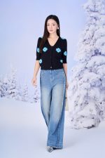 High-quality wool sweater with slim V-neck, slightly puffed sleeves and fashionable patterned body