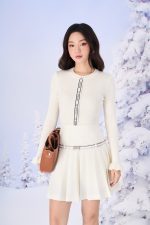 Knitted sweater with round neck, stylized sleeves and fashionable patterns