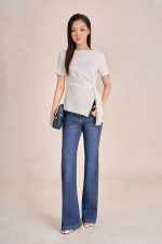 Peplum cotton t-shirt with crew neck, short sleeves and side flap