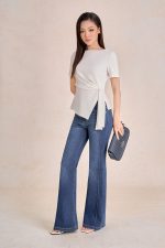 Peplum cotton t-shirt with crew neck, short sleeves and side flap