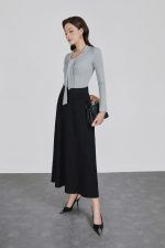 Wool knitted T-shirt with a V-neck cut and a flap to create a fashionable bustier style