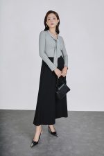 Wool knitted T-shirt with a V-neck cut and a flap to create a fashionable bustier style