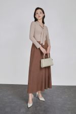 Wool knitted T-shirt with a V-neck cut and a flap to create a fashionable bustier style