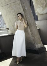 Wool knitted T-shirt with German neckline and styled stone buttons