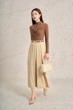 Wool knitted T-shirt with long sleeves, round neck, slit-shaped bust