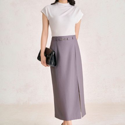 Wool knitted t-shirt with round neck and shoulder sleeves, styled with a shrug