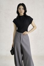 Wool knitted t-shirt with round neck and shoulder sleeves, styled with a shrug