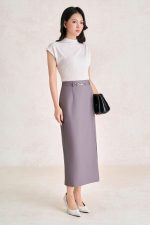 Wool knitted t-shirt with round neck and shoulder sleeves, styled with a shrug