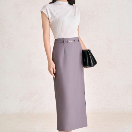 Wool knitted t-shirt with round neck and shoulder sleeves, styled with a shrug