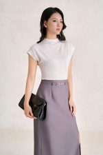 Wool knitted t-shirt with round neck and shoulder sleeves, styled with a shrug