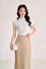 Wool knitted t-shirt with round neck and shoulder sleeves, styled with a shrug