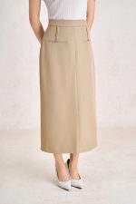 Wool knitted t-shirt with round neck and shoulder sleeves, styled with a shrug